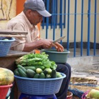 Copan village man with fruit_WM